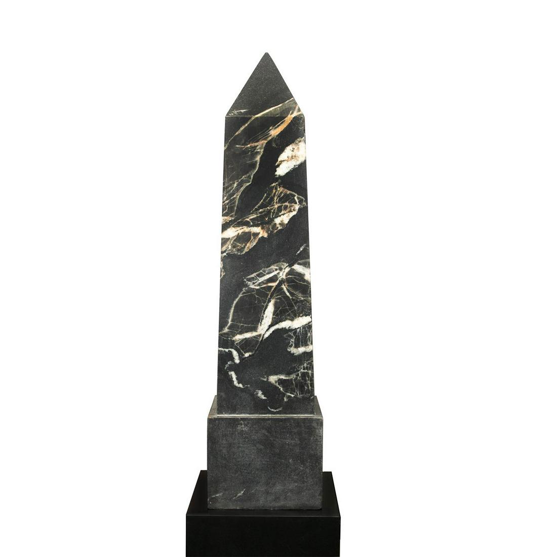 EXTREMELY LARGE BLACK MARBLE OBELISK WITH WOOD STAND: Ashford cut marble, highly decorative stone. Issued: 20th c. Dimensions: 40"H x 10"W Provenance: Collection of John J. Lanzendorf