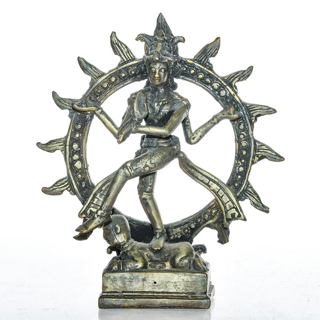 BRONZE ALLEGORICAL HINDU STATUE, SHIVA NATARAJA DANCING: The Hindu god depicted as the cosmic ecstatic dancer. Rich patina. Issued: c. 1980 Dimensions: 6.5"H x 5.5"W Country of Origin: Indonesia Provenance: David Farin Collection