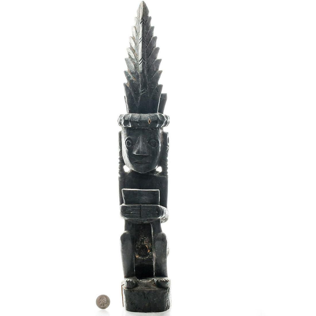 VINTAGE WOODEN INDONESIAN TRIBAL FOLK ART STATUE: Hand carved, rich patina. Grotesque stylized Balinese spirit. Issued: c. 1970 Dimensions: 20"H x 3.5"W Country of Origin: Indonesia Provenance: David Farin Collection