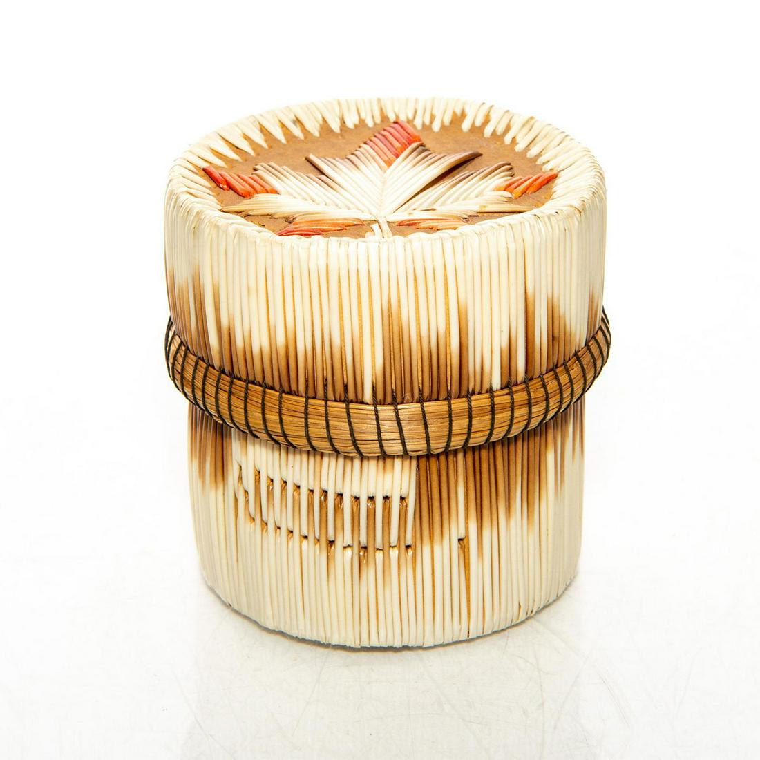 NATIVE AMERICAN TRIBAL PENOBSCOT WOVEN LIDDED BASKET: Exquisitely decorated colors, central flora image. Bark interior. This is a rare and unusual lidded Native American Penobscot woven basket box, sturdily built and handmade with a central large maple l