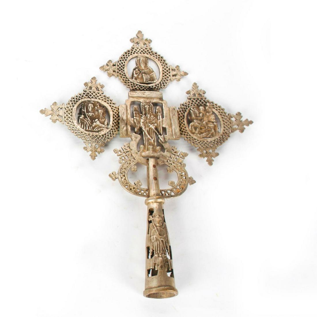 RARE HAND MOLDED COPTIC CROSS WITH RELIGIOUS FIGURES: Reticulated cross staff topper. Issued: 20th c. Dimensions: 20"H Country of Origin: Ethiopia Provenance: David Farin Collection