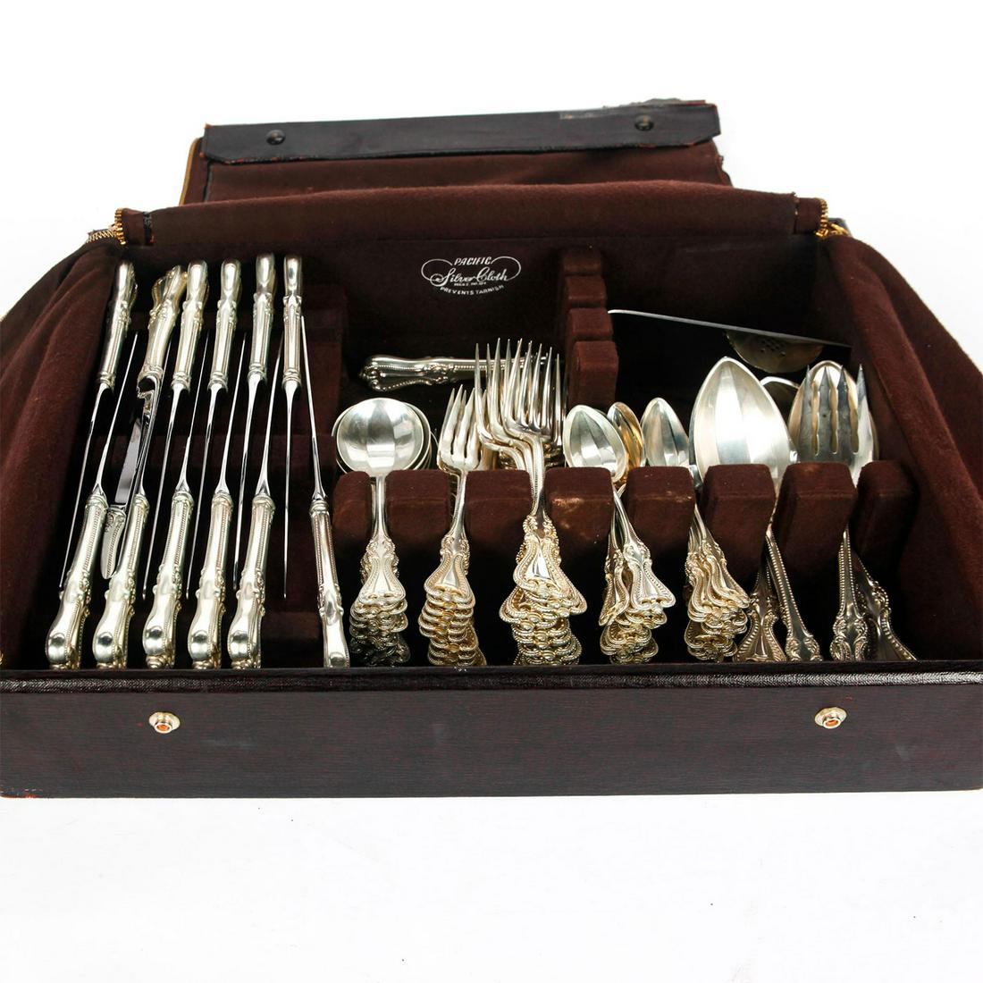 79 PIECE TOWLE OLD COLONIAL SILVER FLATWARE SERVICE: Sterling silver dinner service for 12, with serving utensils. Set includes 12 9.5" knives, 12 soup spoons, 12 7.5" forks, 12 6.25" salad forks, 24 5.5" teaspoons, and 7 serving utensils. No monograms.