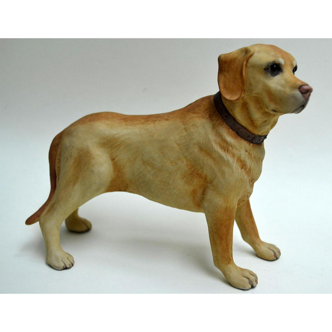 BOEHM PORCELAIN LABRADOR RETRIEVER DOG: Bisque Porcelain Decorated. Hand painted. Hallmark: 40145. Closed Edition. Artist: Boehm Issued: 1985 Dimensions: 5 1/2"H x 6"W x 3"D Manufacturer: Edward Marshall Boehm, Inc. Country of Origin: USA