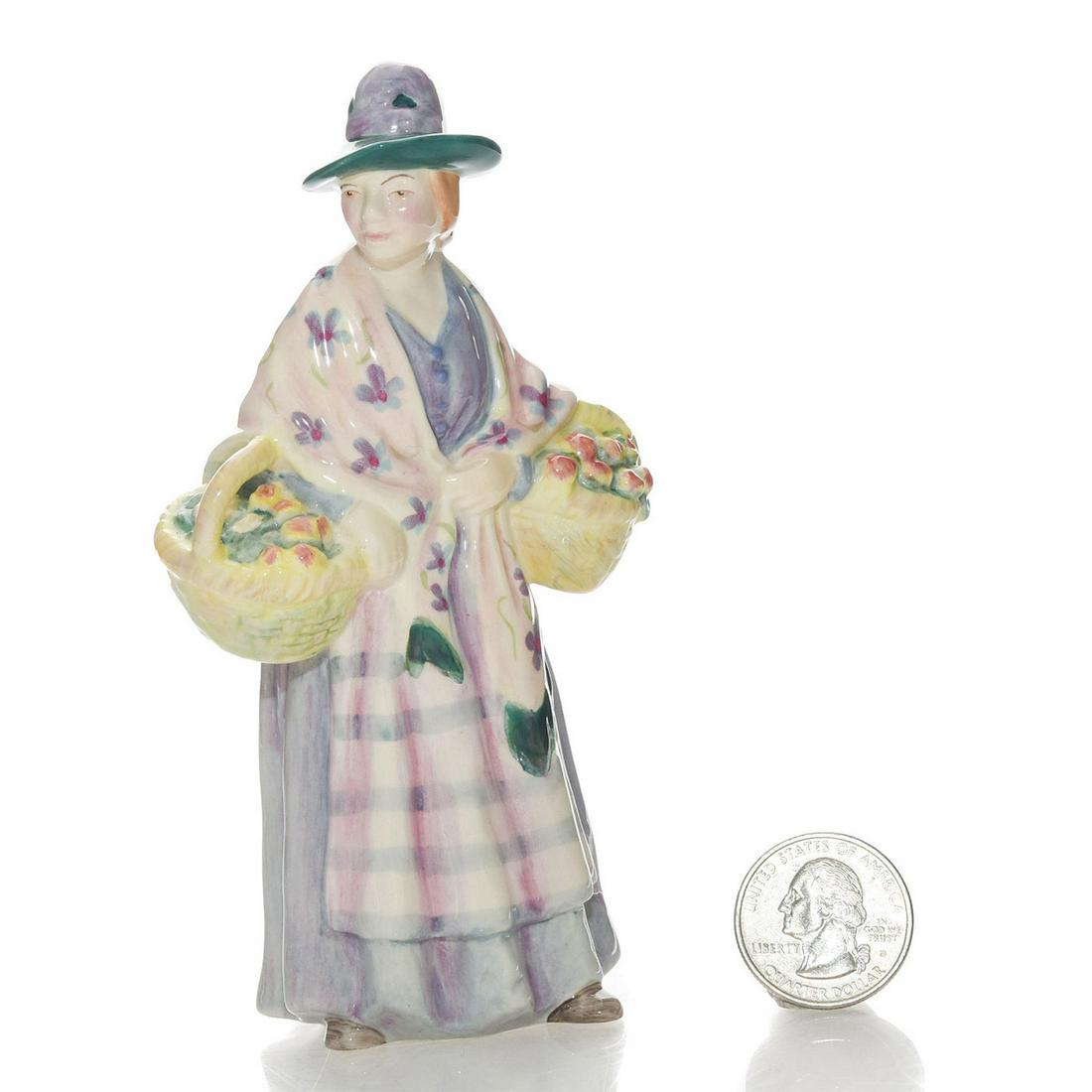 ROMANY SUE HN4812 - ROYAL DOULTON MINI FIGURINE: Part of the Street Vendors Collection. Royal Doulton backstamp. Artist: Leslie Harradine Issued: 2005 - 2008 Dimensions: 4.75"H Manufacturer: Royal Doulton Country of Origin: England