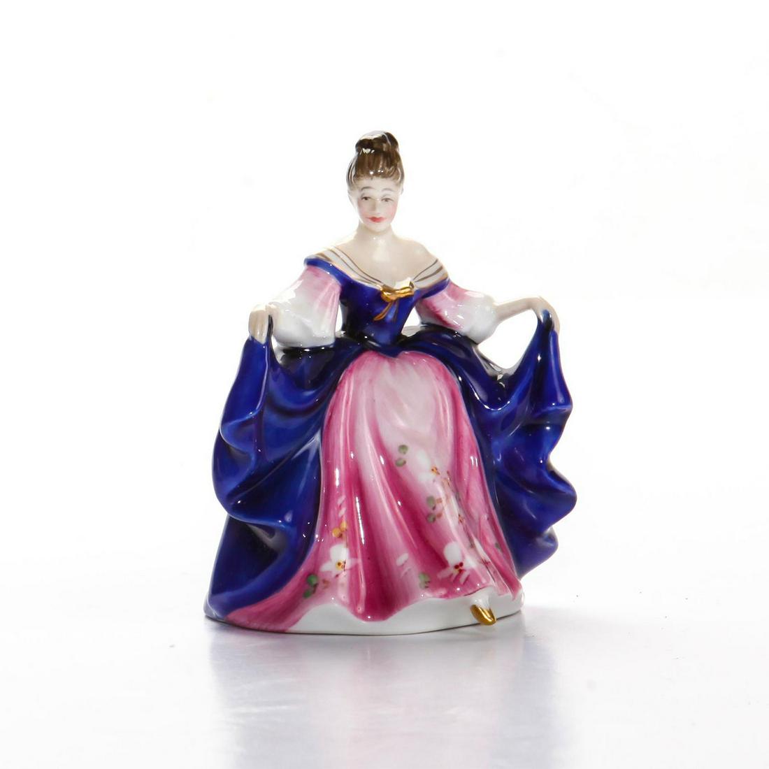 SARA HN3249 - MINI GOLD - ROYAL DOULTON FIGURINE: Miniature Ladies pay tribute to some of the most beloved Pretty Ladies from Royal Doulton's archives. In a world where old fashioned values seems to be long gone, a tradition of craftsmanship still li