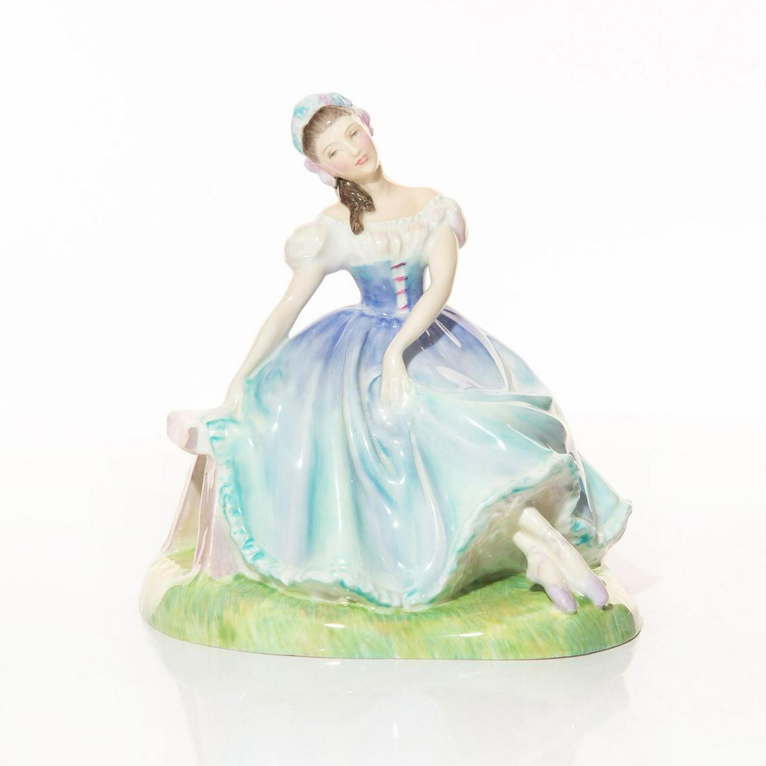 GISELLE HN2139 - ROYAL DOULTON FIGURINE: Ballerina sitting on bench with floral headdress. Artist: Peggy Davies Issued: 1954 - 1969 Dimensions: 6"H Manufacturer: Royal Doulton Country of Origin: England