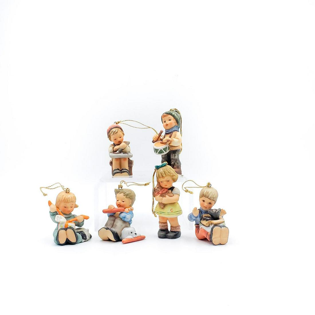 6 GOEBEL HUMMEL CHRISTMAS ORNAMENTS: Berta Hummel Christmas series. Hanging children figures. Goebel backstamps. Issued: 20th c. Dimensions: 3"H, tallest Manufacturer: Goebel