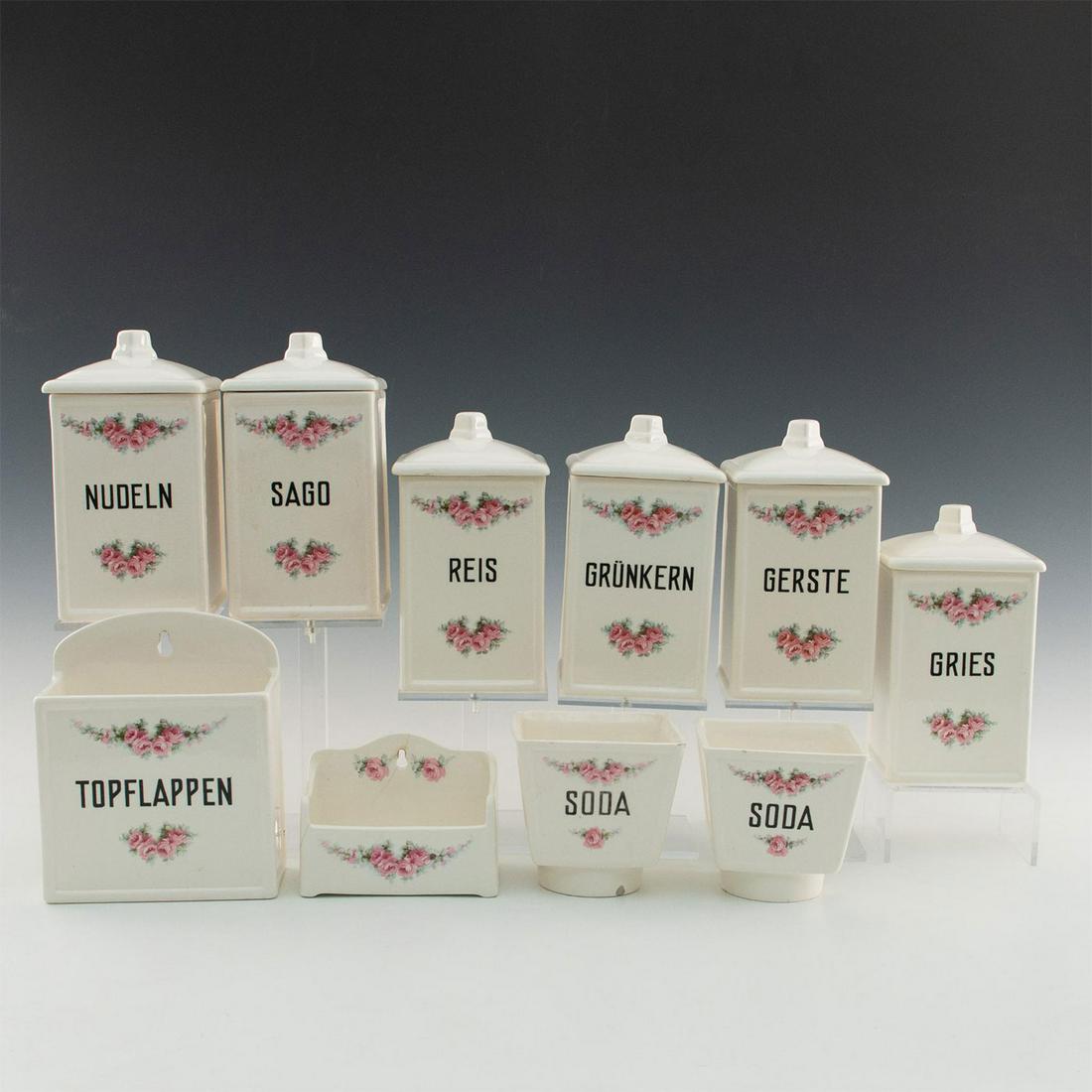 9 GERMAN ART NOUVEAU EARTHENWARE KITCHEN SET: A late 19th century white floral earthenware kitchen set. 1 Max Roesler Rodach Square Container Bowl, stamped to side SODA 4.25"W x 4.25"L x 4.25"H; 1 RVR Roesler Soda Square Footed Container Bowl cir