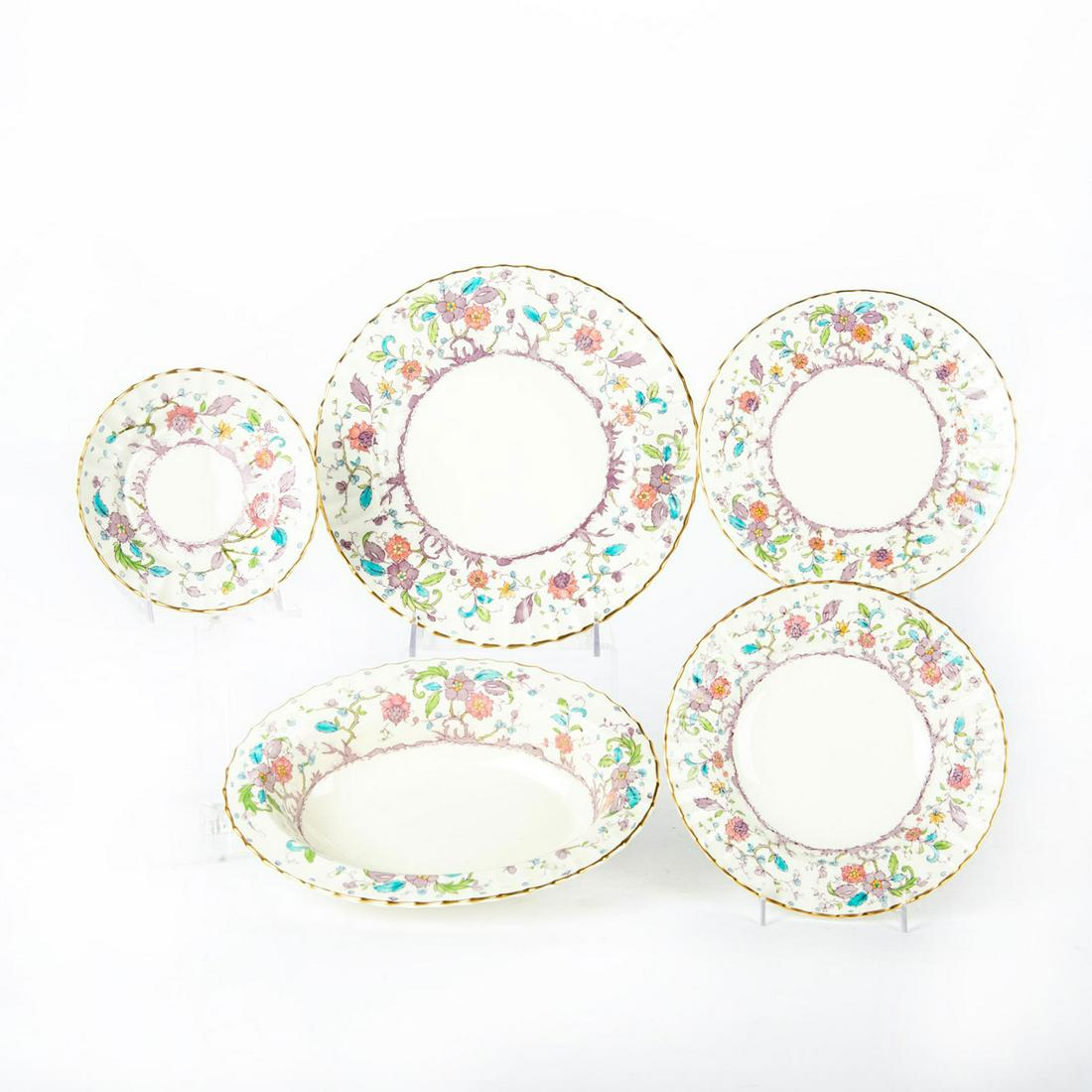 72 PIECE ROYAL WORCESTER KASHMIR DINNER SERVICE: White w. floral design, gilt rims. Set includes 14 dinner plates, 21 salad plates, 24 bread plates, 12 soup bowls, 1 serving bowl. Stamped Royal Worcester Kashmir to bottom. Issued: 20th c. Dimensions