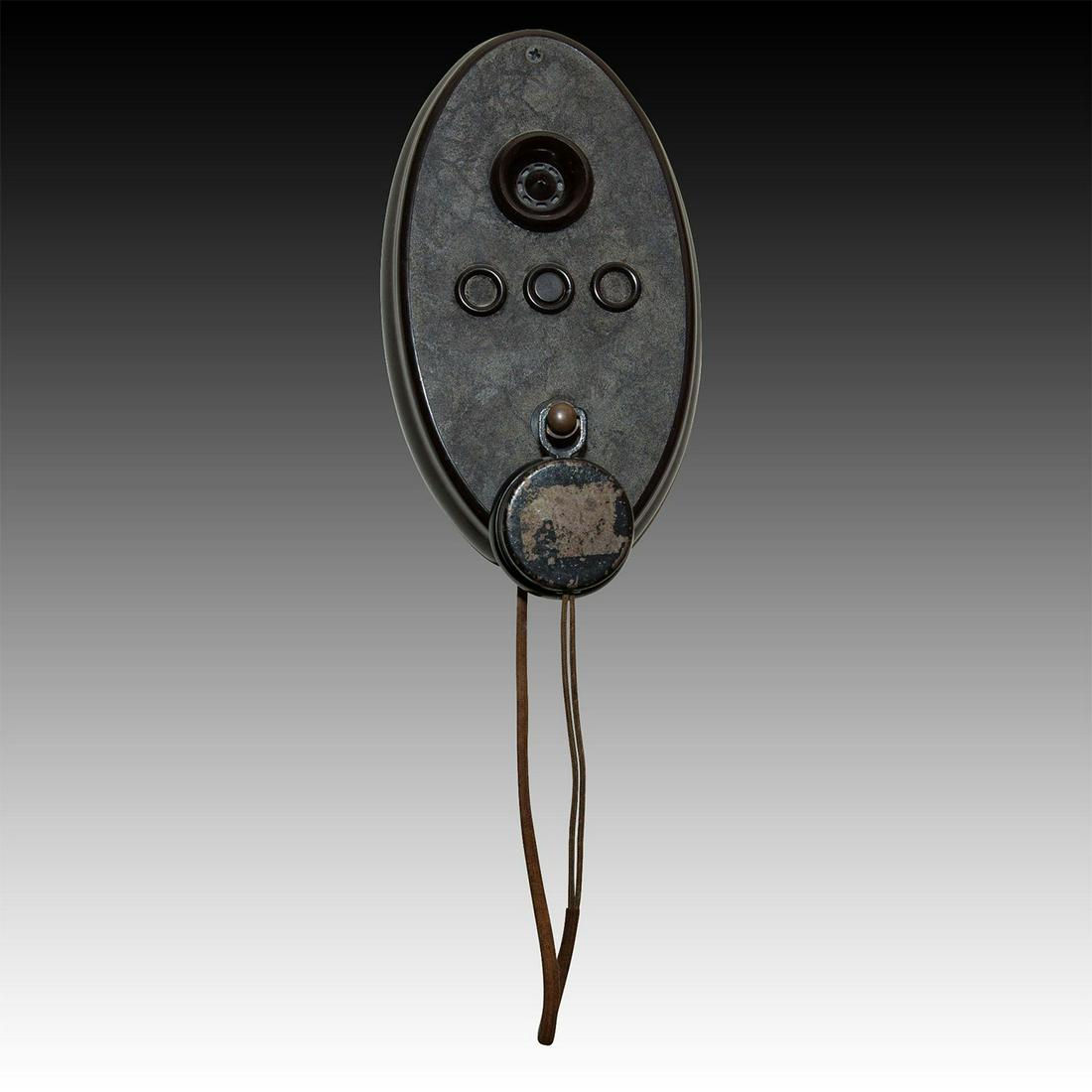 ART DECO BAKELITE INTERCOM: Round handpiece, center intercom button, stylized dark finish. An antique Art Deco Bakelite wall intercom, with round handpiece, center intercom button, and stylized dark finish. Untested, otherwise o