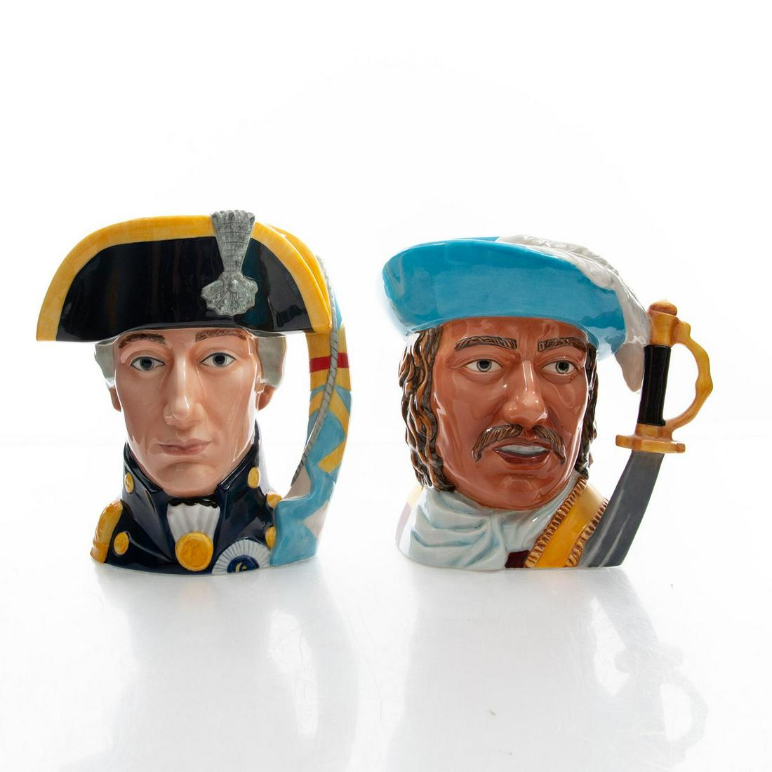 2 LG FRANKLIN PORCELAIN CHARACTER JUGS, MARITIME TRUST: Includes Admiral Lord Nelson and Admiral Robert Blake. Franklin Porcelain Studio marked on the underside. Artist: Gerald Embleton Issued: 1984 Dimensions: 8.25"H, tallest Manufacturer: Franklin Porcel