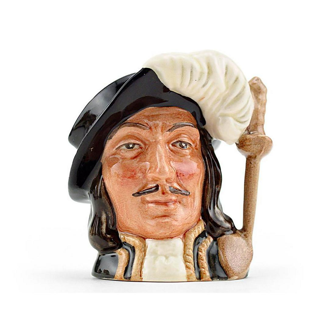 ATHOS D6452 - SMALL - ROYAL DOULTON CHARACTER JUG: Athos D6452 (black hat; white feather; green tunic with gold trim). Designed by Max Henk. Series: The Three Musketeers; Characters from Literature, issued 1956 - 1991. Size: 3.75"H (small)Under the ba