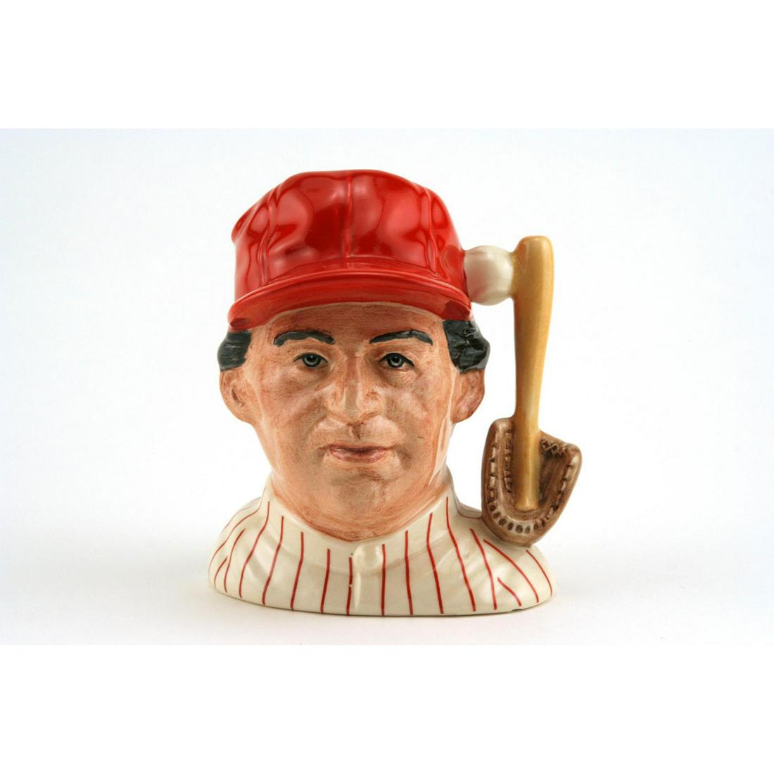 BASEBALL PLAYER D6973 (TORONTO BLUE JAYS) - SMALL -: Royal Doulton Character Jug, Baseball Player Toronto Blue Jays D6973 (blue cap; white jersey with blue trim). Designed by Stanley J. Taylor, issued 1994 in limited edition of 2,500. Size: 4.25"H (smal