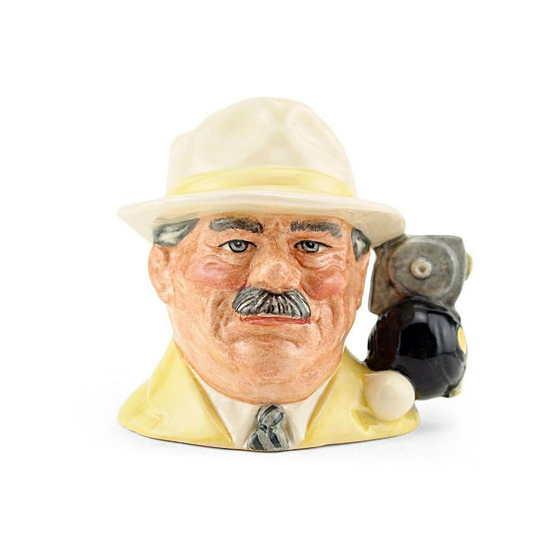 BOWLS PLAYER D6896 - SMALL - ROYAL DOULTON CHARACTER: Royal Doulton Character Jug, Bowls Player D6896 (white and yellow coloration). Designed by Stanley J. Taylor. Series: Characters From Life, issued 1991 - 1995. Size: 4"H (small)Bowls is a British game