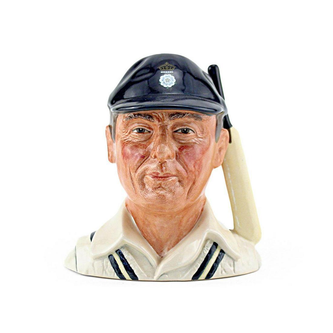 HAMPSHIRE CRICKETER D6739 - SMALL - ROYAL DOULTON: Hampshire Cricketer D6739 (navy blue cap; cream sweater with navy/yellow stripes). Designed by Harry Sales. Series: Cricketers, issued 1985 in limited edition of 5,000. Size: 5"H (small) This Hampshir