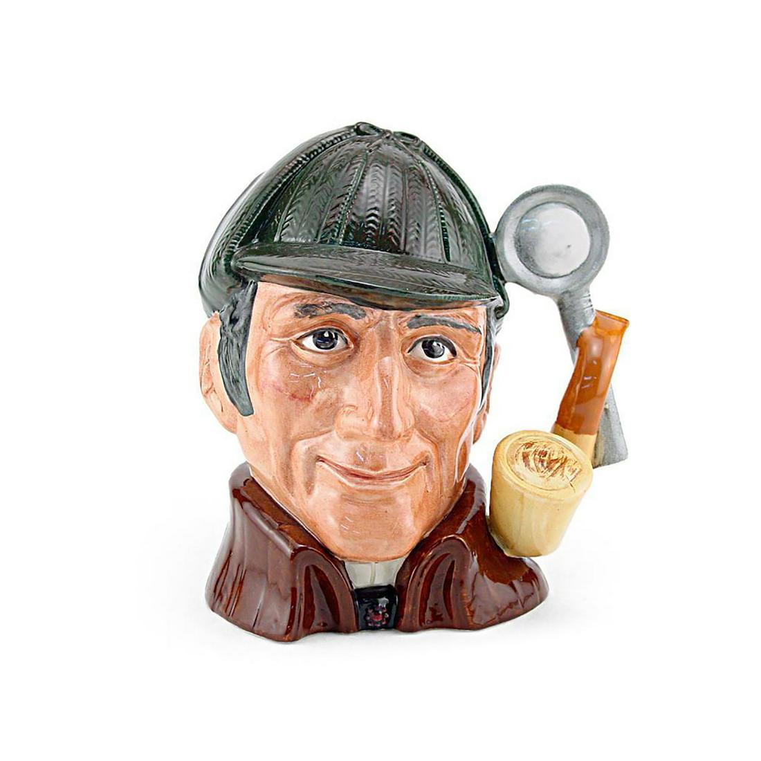 SLEUTH D6635 - SMALL - ROYAL DOULTON CHARACTER JUG: Royal Doulton Character Jug, Sleuth D6635 (dark green deerstalker hat; brown cloak). Designed by Alan Moore, issued 1973 - 1996. Size: 3.25"H (Small)Arthur Conan Doyle (1859 - 1930), an unsuccessful d