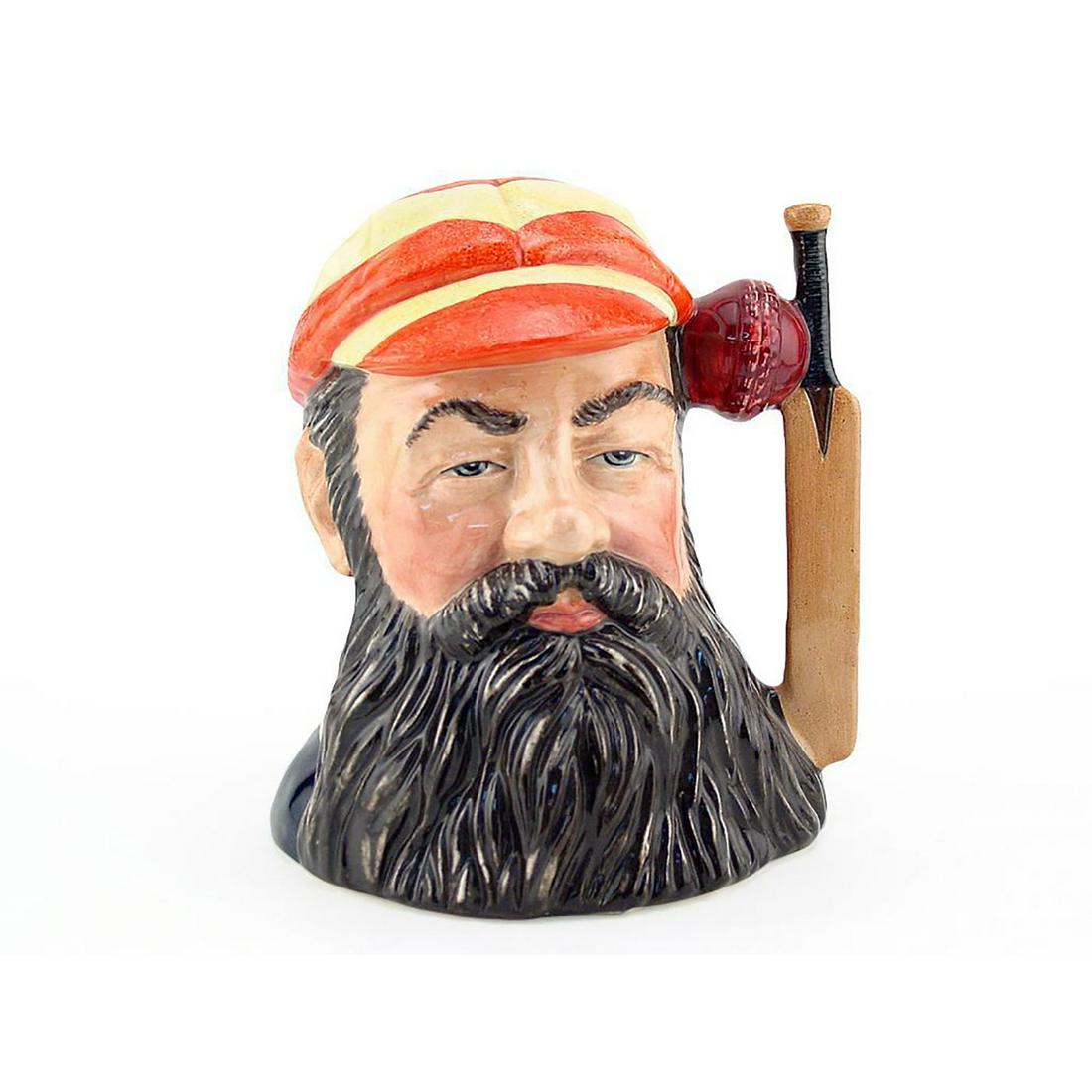 WG GRACE D6845 - SMALL - ROYAL DOULTON CHARACTER JUG: W.G. Grace D6845 (yellow and orange striped cap; black beard). Designed by Stanley J. Taylor. Series: Cricketers, issued 1989 in limited edition of 9,500. Size: 3.25"H (Small)William Gilbert Grace (18