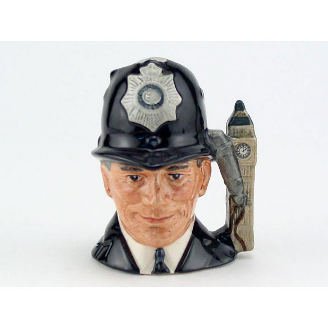 LONDON BOBBY D6763 (NON EMBOSSED) - MINI - ROYAL: Royal Doulton Character Jug, London Bobby D6763 (black uniform; white and black helmet badge; grey whistle). Designed by Stanley J. Taylor. Series: The London Collection, issued 1987 - 1991. Size: 2.5