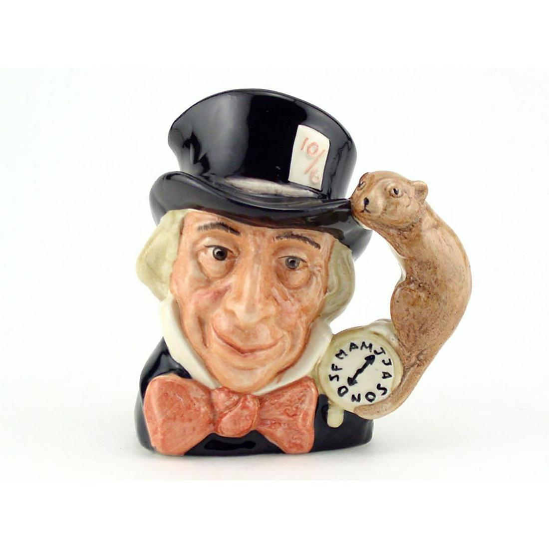 MAD HATTER D6606 - MINI - ROYAL DOULTON CHARACTER JUG: Royal Doulton Character Jug, Mad Hatter D6606 (black hat; dark red bow tie). Designed by Max Henk. Series: Alice in Wonderland, issued 1965 - 1983. Size: 2.5"H (Mini)A character from Lewis Carroll's "