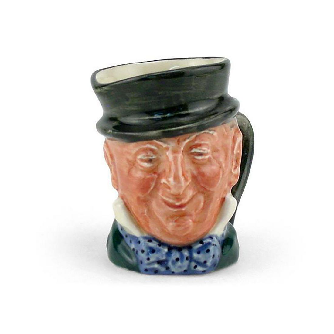 MR. MICAWBER D6138 - MINI - ROYAL DOULTON CHARACTER JUG: Royal Doulton Character Jug, Mr. Micawber D6138 (black hat; green coat; blue polka-dot bow tie). Designed by Leslie Harradine and Harry Fenton. Series: Charles Dickens' Characters, issued 1940 - 1960.