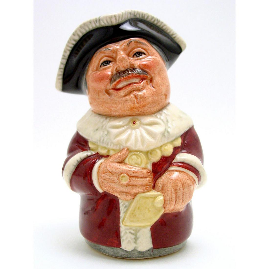 ALDERMAN MACE THE MAYOR D6766 - ROYAL DOULTON TOBY JUG: Royal Doulton Toby Jug, Alderman Mace D6766 (red coat trimmed with gold; white collar and scarf; black hat trimmed with gold, and white feathers). Designed by William K. Harper. Series: The Doultonvil