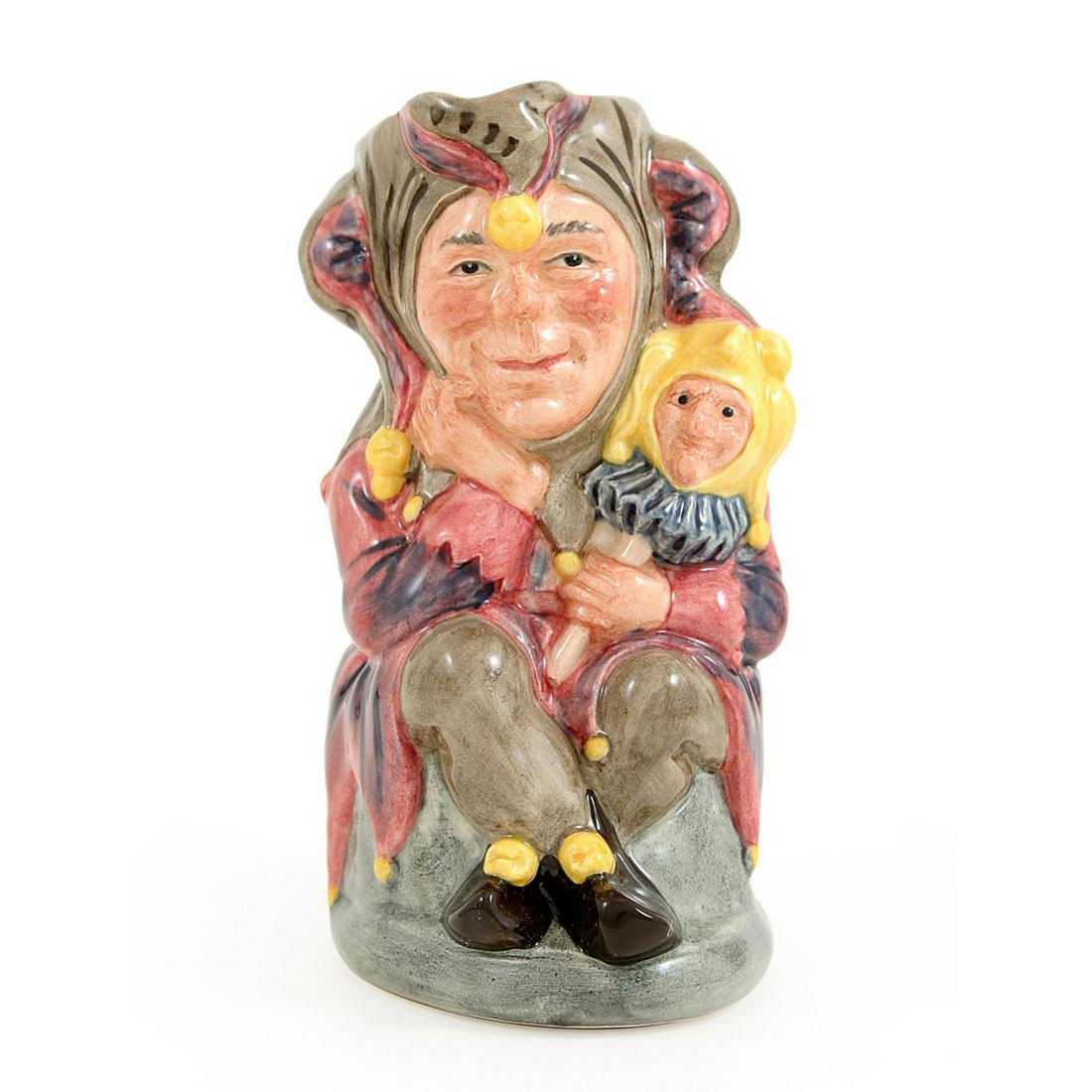 JESTER D6910 - ROYAL DOULTON TOBY JUG: Royal Doulton Toby Jug, Jester D6910 (mauve and brown costume with yellow bobbles). Designed by Stanley J. Taylor, issued 1992 in limited edition of 2,500. Size: 5''H (small) - Jesters Edition Number: