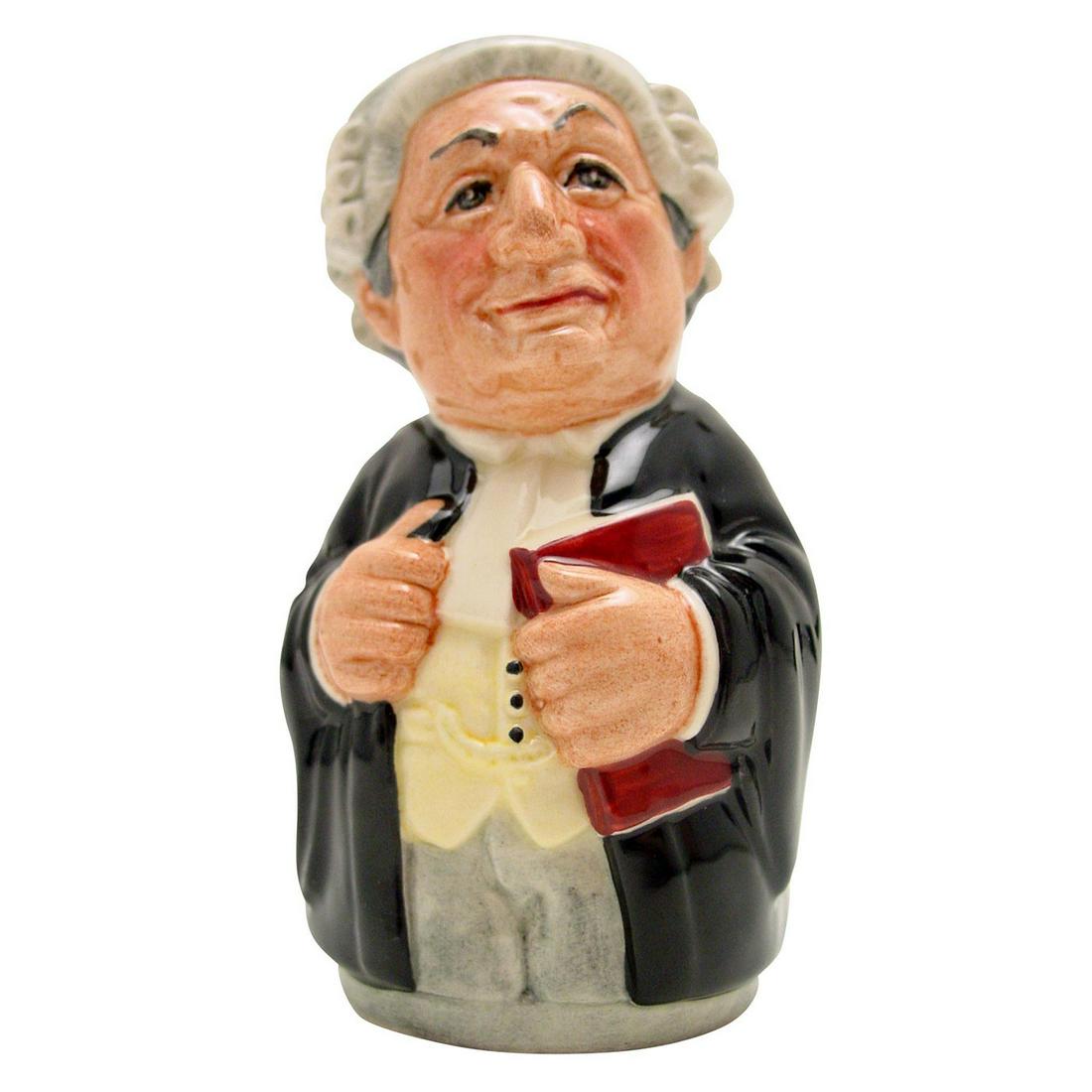 MR. LITIGATE THE LAWYER D6699 - ROYAL DOULTON TOBY JUG: Royal Doulton Toby Jug, Mr. Litigate the Lawyer D6699 (black robes; yellow waistcoat; grey wig and trousers). Designed by William K. Harper. Series: The Doultonville Collection, issued 1983 - 1991. Si