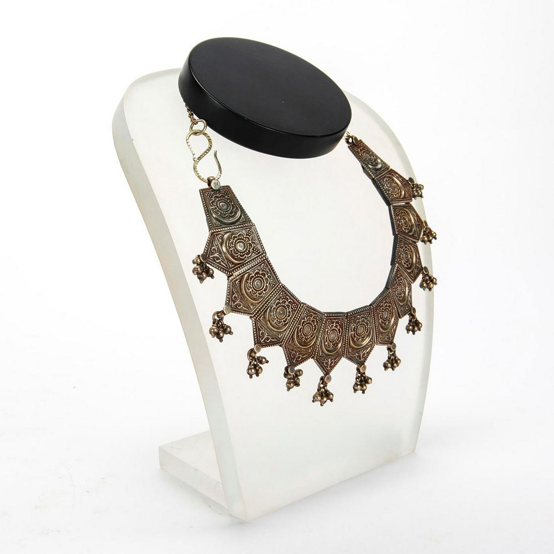 20TH C. ASIAN 800 SILVER COLLAR NECKLACE: 13 links, w. floral, geometric design, hanging baubles. Necklace is stamped 80. Oxidation/patina consistent with age. Total weight is approximately 83g. Issued: 20th c. Dimensions: 16"L