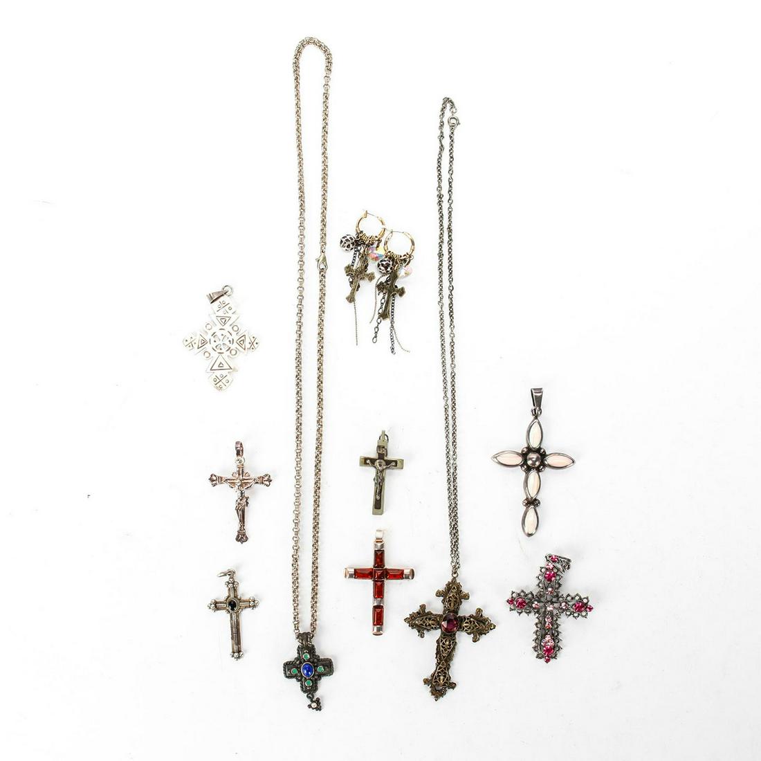 9 CHRISTIAN CRUCIFIX CROSS PENDANTS, 1 PAIR EARRINGS: Mixed metals, including sterling silver. 2 pendants w. chain. Issued: 20th c. Dimensions: 3.75"H, largest pendant