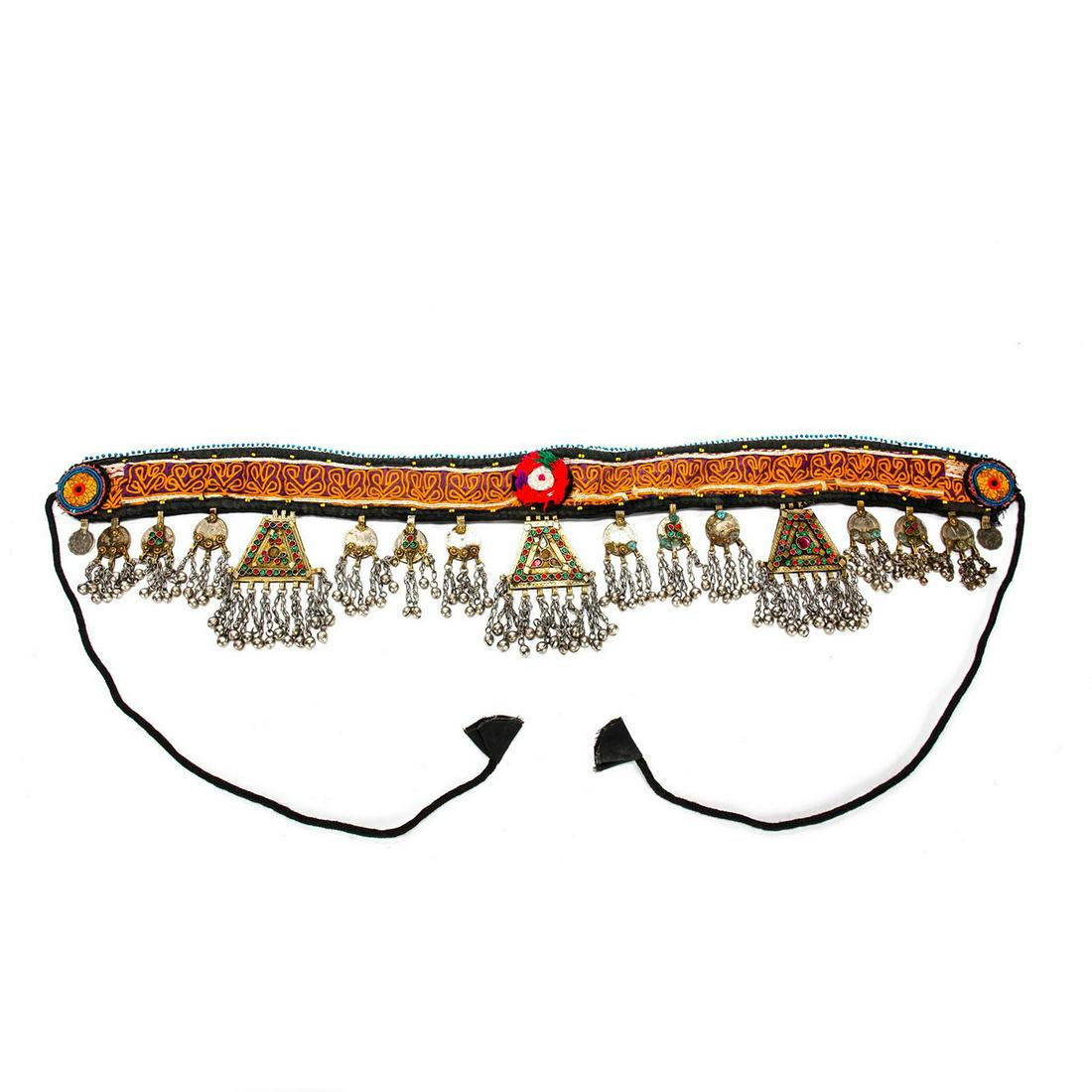 ORNATE 20TH C. KUCHI TRIBAL BELLY DANCE BELT: Embroidered fabric w. beadwork, hanging adornments, coins. Coins are of Afghani and Pakistani origin. Belt is missing a few inset beads on adornments. Issued: 20th c. Dimensions: 72"L, overall Country