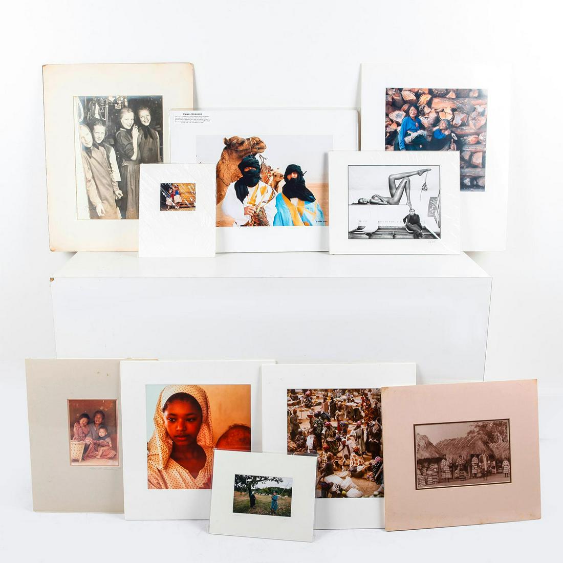 GROUP OF 10 INTERNATIONAL PHOTOGRAPHS, HUMAN SUBJECTS: Matte framed, artist signed. People of Italy, Nepal, Thailand, etc. Issued: c. 1999 Dimensions: 20"L x 16"W, largest Country of Origin: United States