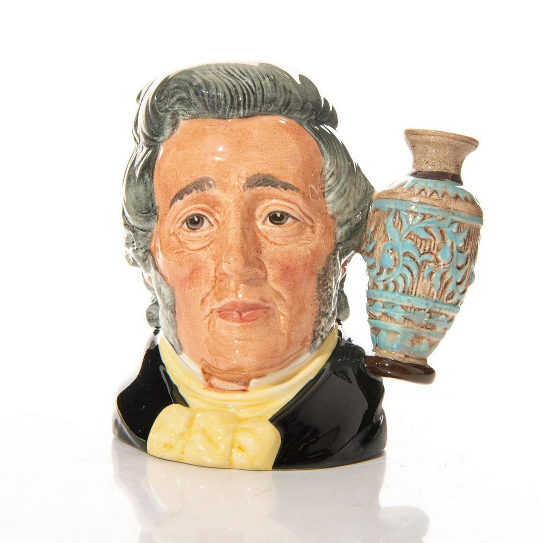 ROYAL DOULTON SMALL CHARACTER JUG, SIR HENRY DOULTON: D6703. Designed exclusively for Royal Doulton Collectors Club. Vase handle. Royal Doulton backstamp. Artist: Eric Griffiths Issued: 1984 Dimensions: 4.5"H Manufacturer: Royal Doulton Country of Origin
