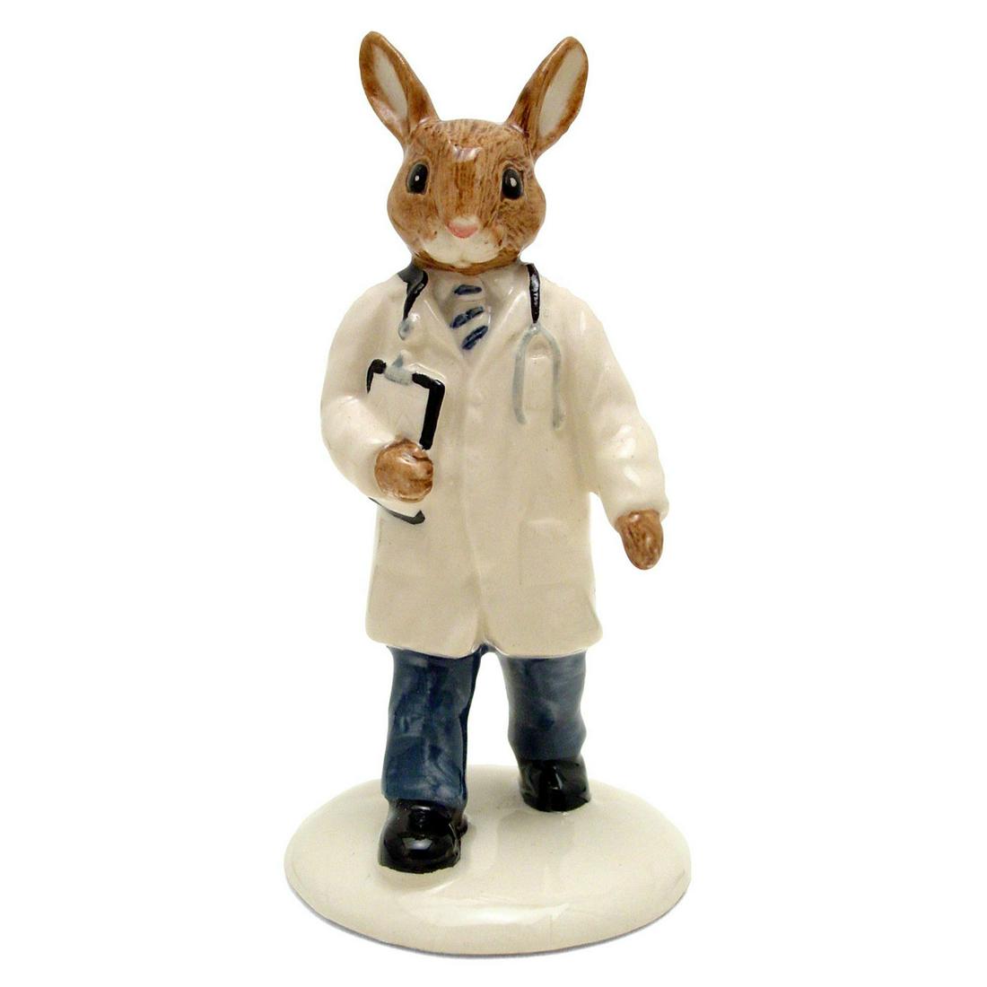 DOCTOR DB181 - ROYAL DOULTON BUNNYKINS: White lab coat and shirt, white and blue striped tie. Includes original box. Bunnykins backstamp. Artist: M. Alcock Issued: 1998 - 2000 Dimensions: 4.25"H Manufacturer: Royal Doulton Country of Origin