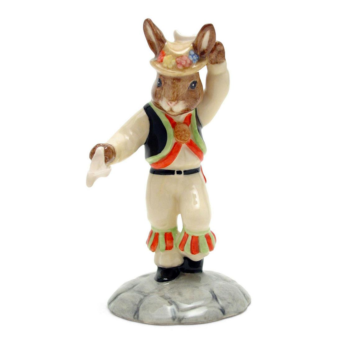 MORRIS DANCER DB204 - ROYAL DOULTON BUNNYKINS: Cream, black, red and green. Includes original box. Bunnykins backstamp. Artist: C. Dadd Issued: 2000 - 2000 Dimensions: 4.5"H Manufacturer: Royal Doulton Country of Origin: England