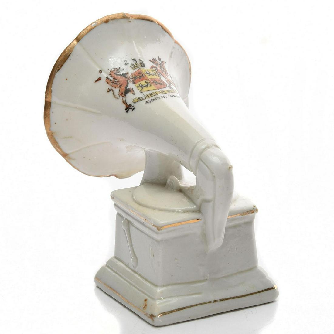 BRITISH CRESTED CHINA PHONOGRAPH VICTROLA, WALES: Glazed white china with gilt and other decoration. Issued: c. 1950 Dimensions: 3.25"H Country of Origin: England