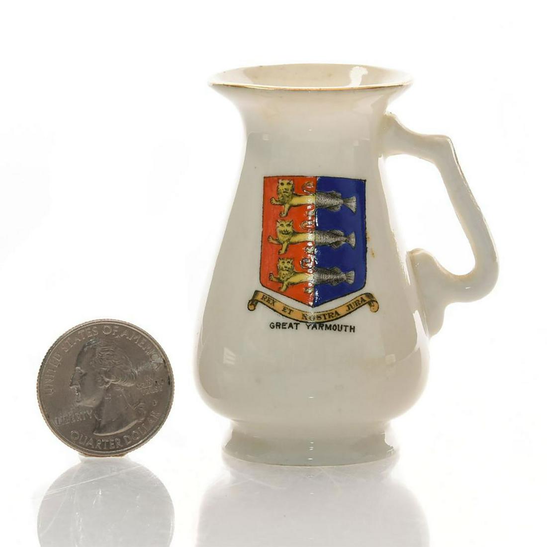 FOLEY CHINA MINIATURE CRESTED JUG, GREAT YARMOUTH: Marked REX ET NOSTRA JURA. Bottom base marked MANUFACTURED FOR BUCK'S CHINA ROOM ST. GEORGE'S HALL GREAT YARMOUTH. The Foley China backstamp. Issued: 20th c. Dimensions: 2.5"H Manufacturer: The Foley