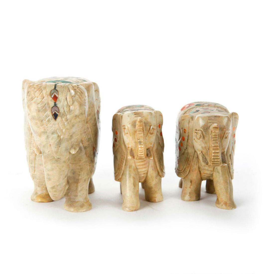 HAND CARVED INDIAN INLAID SOAPSTONE ELEPHANTS: 3 elephants was inlaid with semi precious stones from India. 3 vintage elephants was inlaid with multiple types stones and mother of pearl. The big one has some chirped on but the 2 smaller are in goo