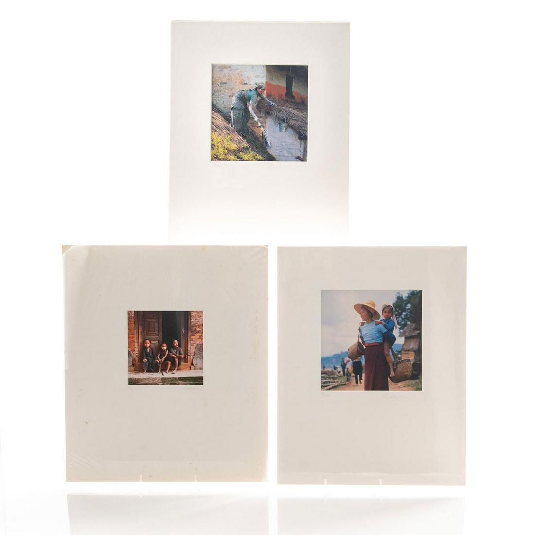 3 EMERSON MATABLELE PHOTOGRAPHY PRINTS, ASIA: Limited edition of 150 and 250 photographed in Nepal and China. White matte. Titled MAMA DE BAO BEI! CHINA number 22/250. THE CONJURE WOMAN NEPAL number 37/250. NEPAL number 28/150. Minor damage to co