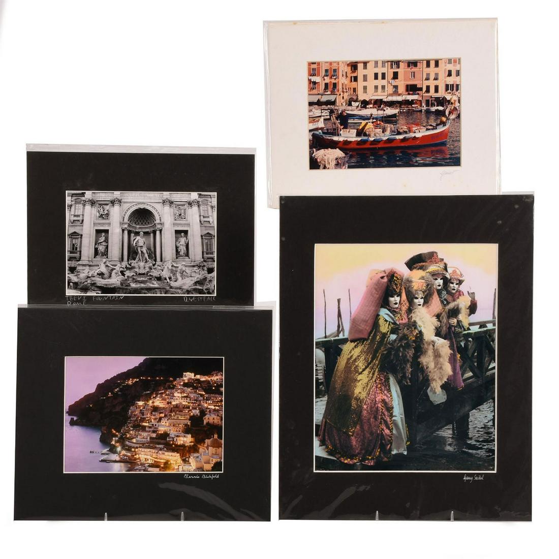 FOUR PHOTOGRAPHIC PRINTS OF SCENES OF ITALY: Four striking images of various scenes in Italy. Venice by Luciano Duse 8"L x 10"W, Positano Twilight by Bernard Blekfeld 8"L x 10"W, Trevi Fountain - Rome by D. Westfall 8"L x 10"W and Four Ladies at