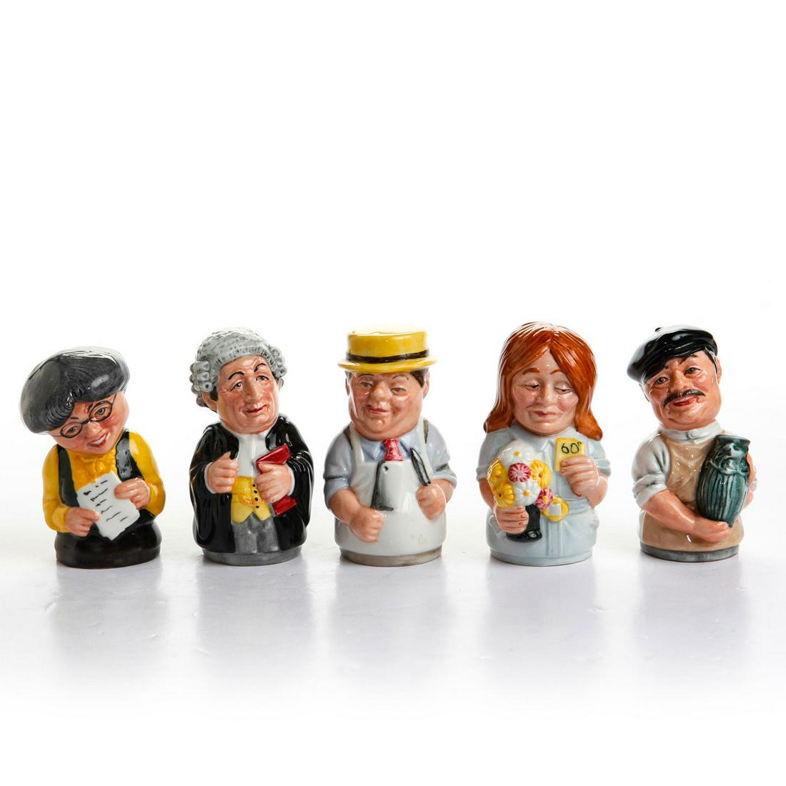 5 ROYAL DOULTON CHARACTER CANDLE SNUFFERS: 5 Various characters by William Harper, Doulton backstamp. Flora Fuchsia the Florist derivative D6767, Mr. Brisket the Butcher derivative D6743, Mr. Litigate the Lawyer D6699, Albert Sagger the Potter