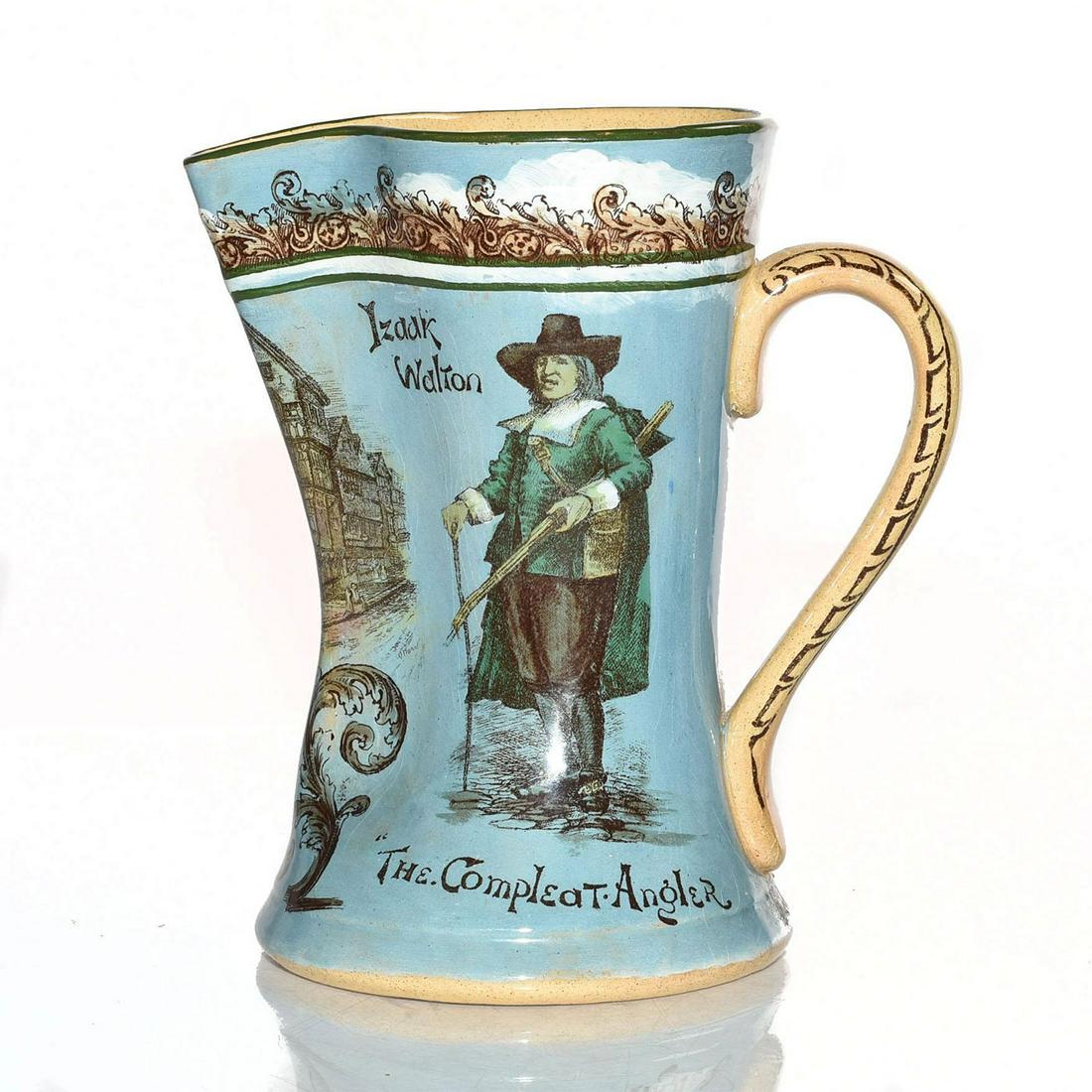 ROYAL DOULTON IZAAK WALTON FISHERMAN PITCHER: Izaak Walton, the Complete Angler. Ceramic pinch top pitcher. Based on book by famed author. Blue colorway, green rim. Doulton backstamp. Light crazing to body. Issued: 20th c. Dimensions: 7.75"H x 7.