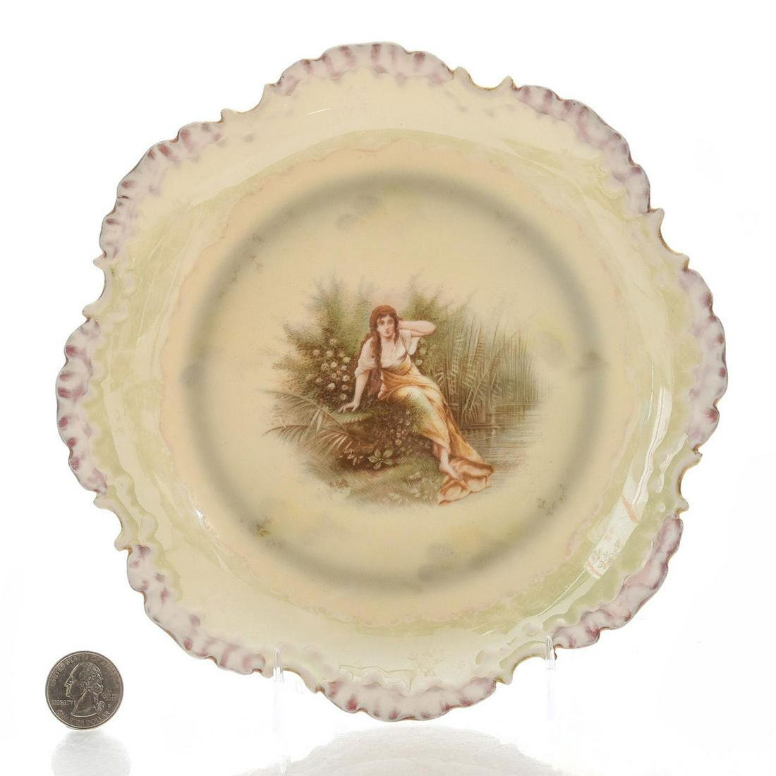 BAVARIAN WHITE PORCELAIN PLATE, NEOCLASSICAL MOTIFS: White china, scalloped rim. Female subject. BAVARIA backstamp. Issued: c. 1915 Dimensions: 8"D Country of Origin: Bavaria Provenance: David Farin Collection