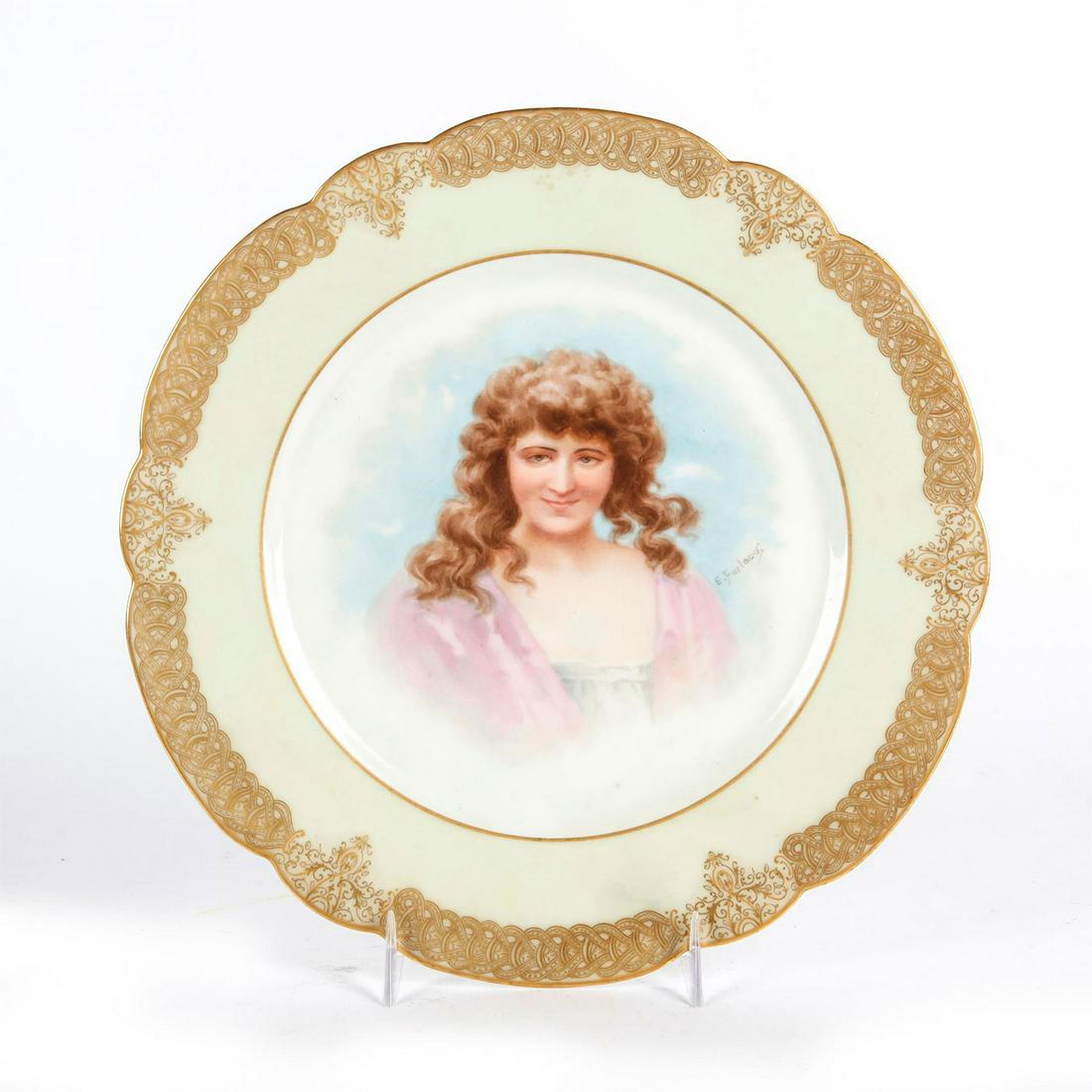 LIMOGES FRENCH ART NOUVEAU CERAMIC PORTRAIT PLATE: Cream with gilt decoration, central image of woman. LIMOGES backstamp. Issued: c. 1910 Dimensions: 9.5"D Manufacturer: Limoges Country of Origin: France Provenance: David Farin Collection