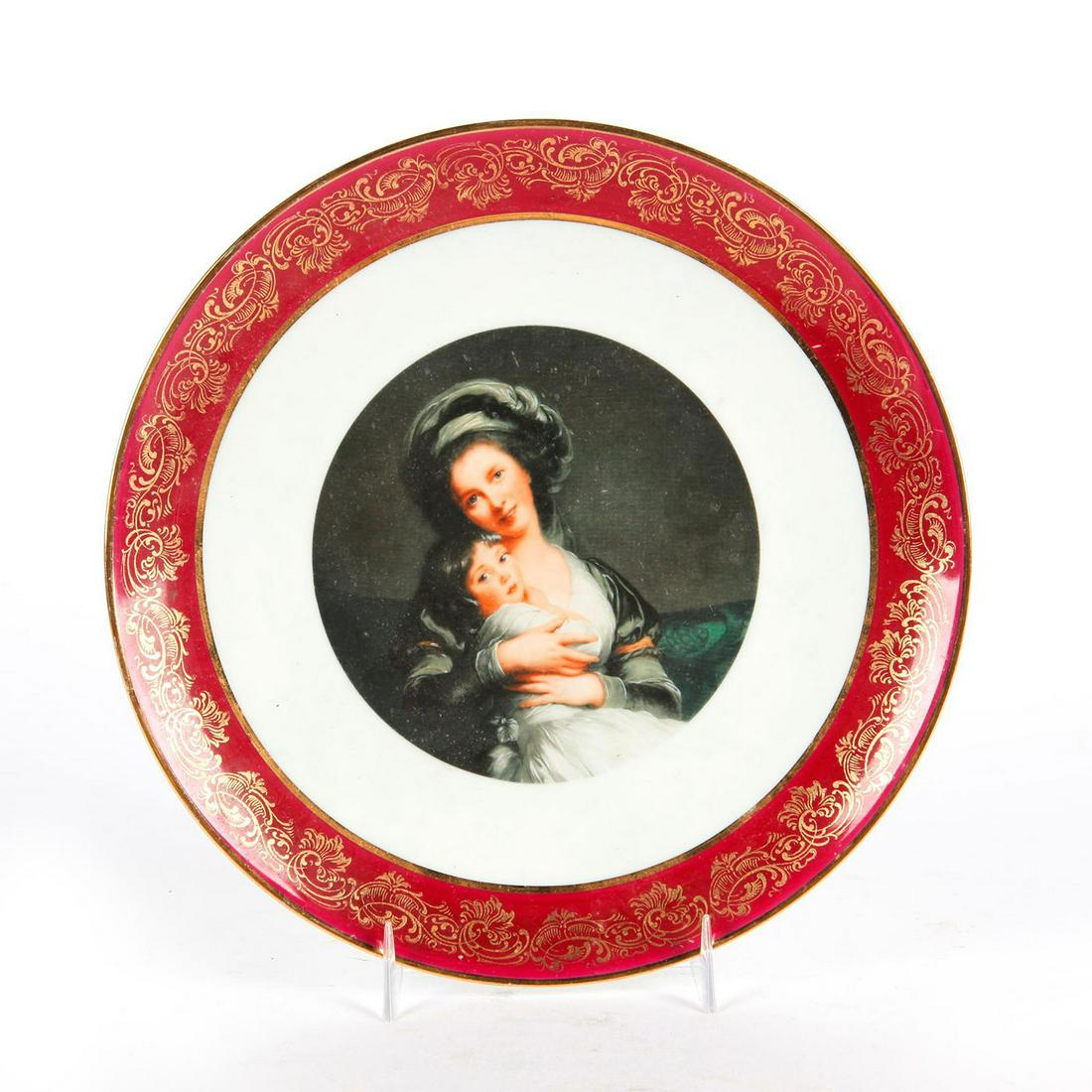 LIMOGES FRENCH ART NOUVEAU CERAMIC PORTRAIT PLATE: Red with gilt decoration, central image of woman. LIMOGES backstamp. Issued: c. 1910 Dimensions: 9"D Manufacturer: Limoges Country of Origin: France Provenance: David Farin Collection