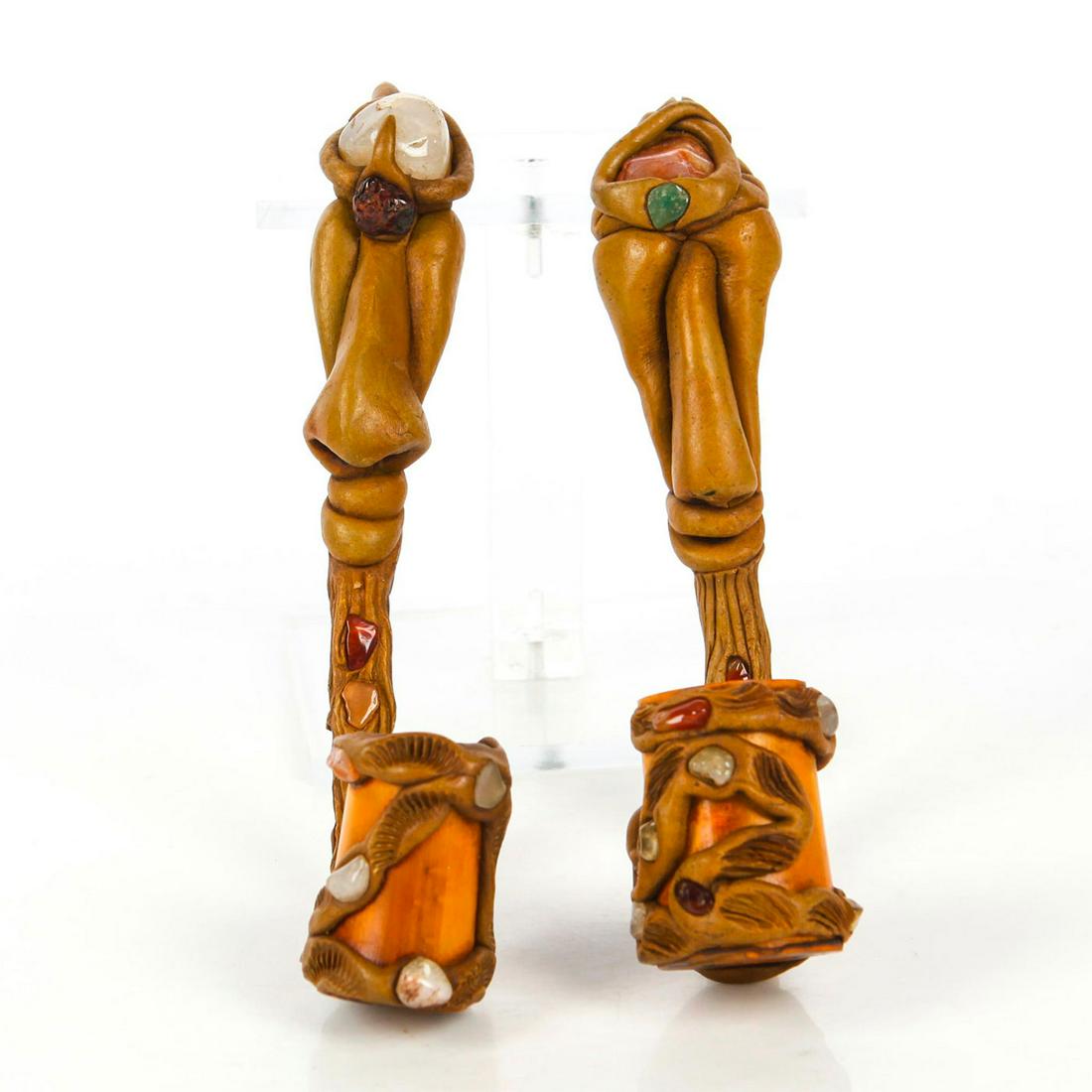 GROUP OF 2 BAMBOO PIPES WITH NATURALISTIC MATERIALS: Whimsical grotestque renderings with natural stones and materials. Issued: c. 2000 Dimensions: 6.25"H x 5.5"W Provenance: David Farin Collection