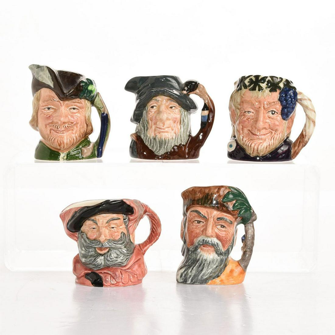 5 ROYAL DOULTON MINIATURE JUGS, LITERARY CHARACTERS: Falstaff, Bacchus, Rip Van Winkle, Robin Hood, Robinson Crusoe. Artist: Max Henk, Harry Fenton, Geoff Blower, Issued: 20th c. Dimensions: 2.5"H, tallest Manufacturer: Royal Doulton Country of Origin: 