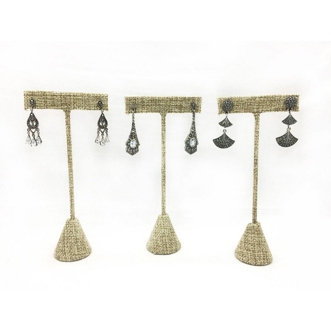 3 PAIRS STERLING SILVER MARCASITE EARRINGS: Beautiful marcasite earrings, two pairs with stones. Two pairs are stamped. The lengths are 1.75"L, 1.5"L and 1.5"L. The total weight of all three is 19.0g. Issued: 20th c. Provenance: David Farin Col