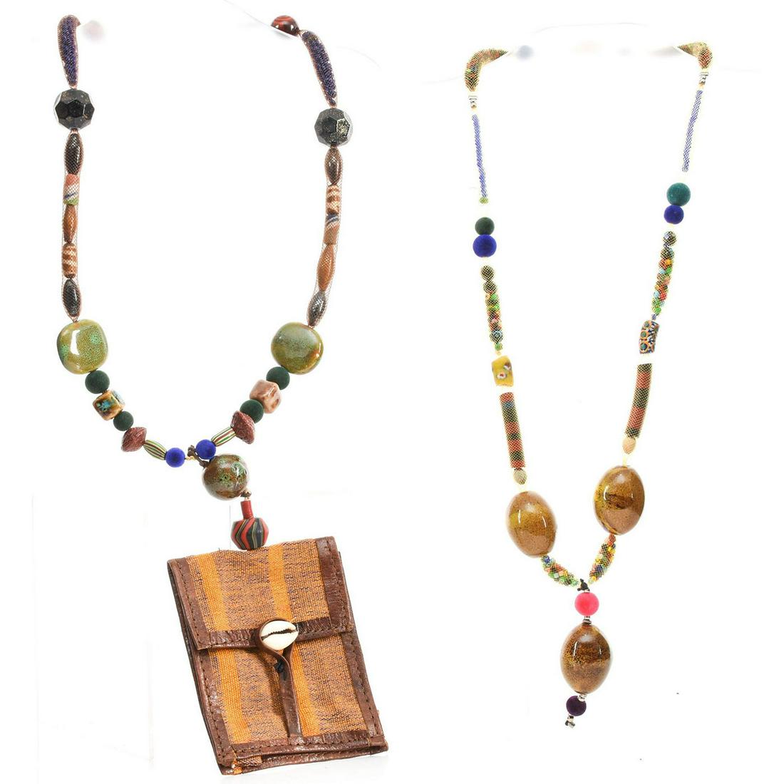 LARGE NATURALISTIC STONED NECKLACES WITH POUCH: 2 necklaces. Total weight 254g. Necklace sizes 28". Issued: 20th c. Dimensions: Total weight 254g. Provenance: David Farin Collection