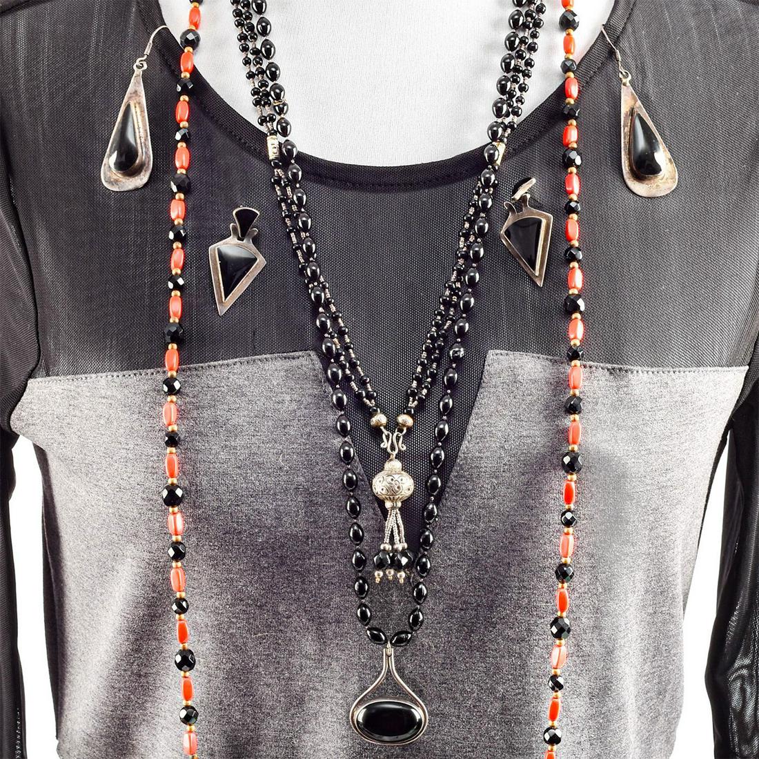 ONYX FACETED BEADED TIBETAN JEWELRY: 3 necklaces and 2 earrings. Total weight 132g. Necklace sizes 20", 24", 42". Issued: 20th c. Dimensions: Total weight 132g. Provenance: David Farin Collection