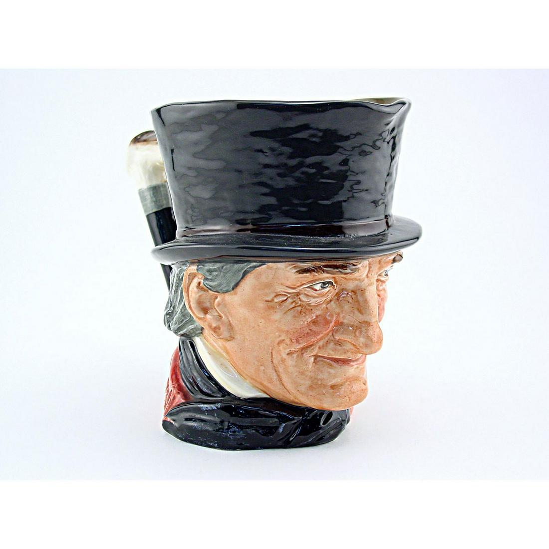 JOHN PEEL D5731 - SMALL - ROYAL DOULTON CHARACTER JUG: John Peel D5731 (dark grey hat; maroon coat; dark blue bow tie; grey riding crop). Designed by Harry Fenton, issued 1937 - 1960. Size: 3.5"H (Small) John Peel (1776 - 1854) was a famous English huntsm